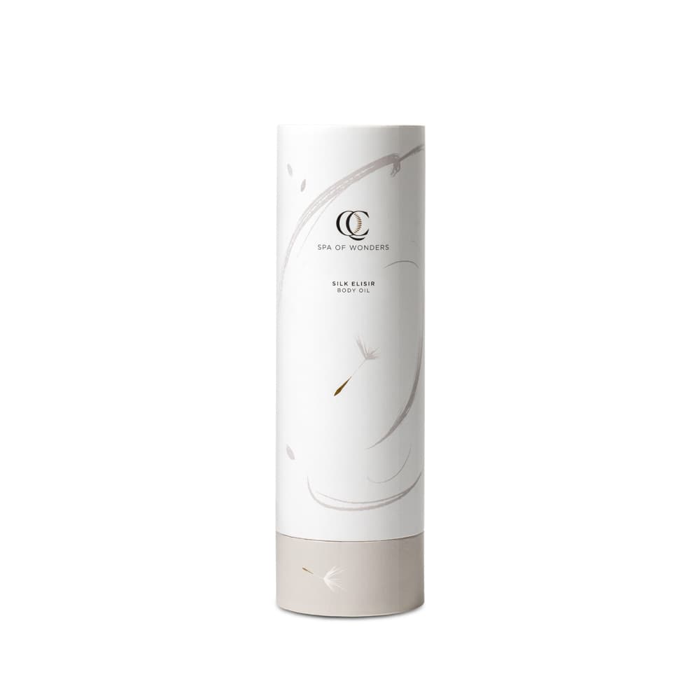 Confezione esterna olio corpo, bianca con tappo coordinato, etichetta frontale visibile, sfondo neutro.
